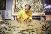 سریع&zwnj;ترین خوش نویس ایران پنجاه قرآن کتابت کرده است