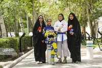 پرچم دختران مشهد بالاست