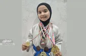 هلیا رمزی مدال&zwnj;هایش را به موزه امام&zwnj;رضا(ع) اهدا می&zwnj;کند