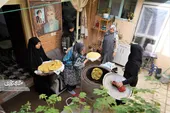 عطر نان نذری فاطمه مؤذنی در محله امیرالمومنین(ع) می&zwnj;پیچد